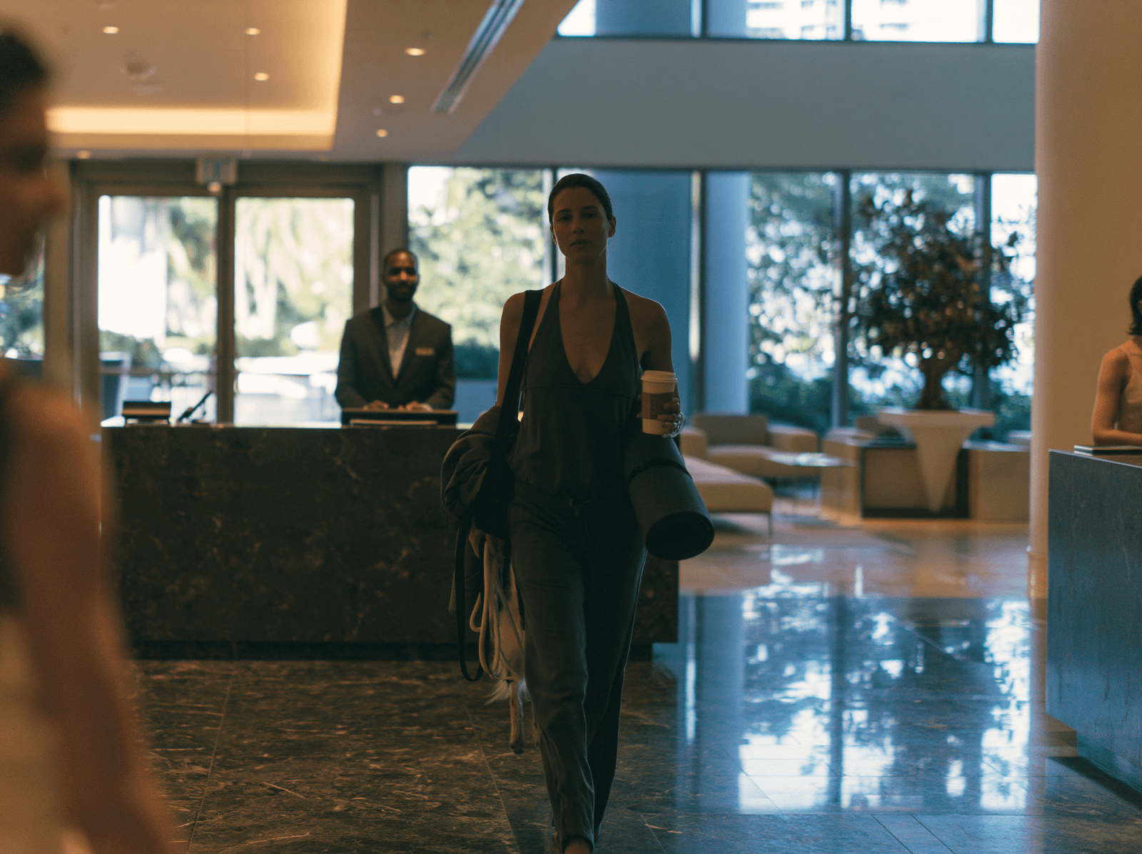 Guest arriving at a grand hotel lobby reception