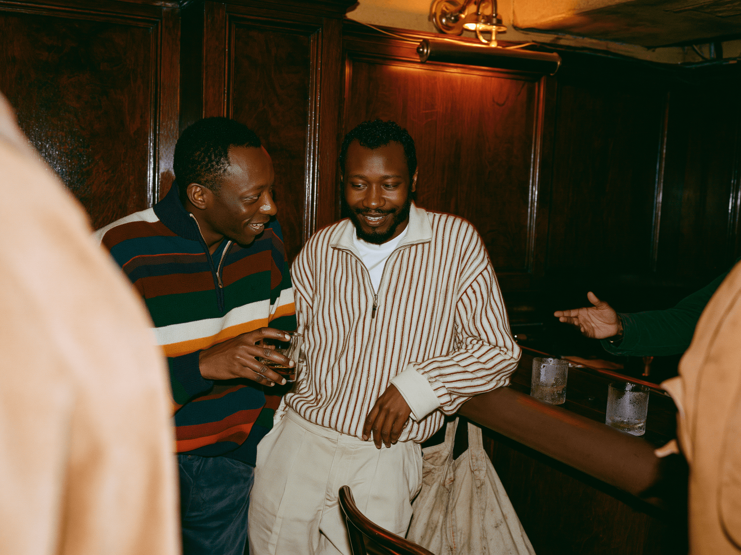 A member relaxing with a glass of wine at the club