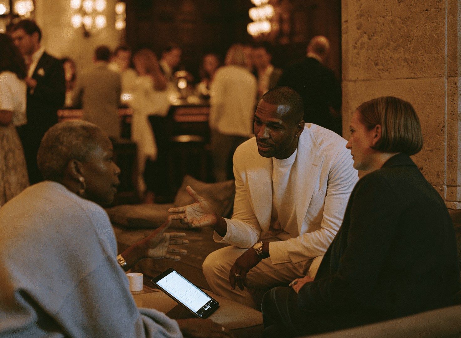 Members talking together in a club lounge