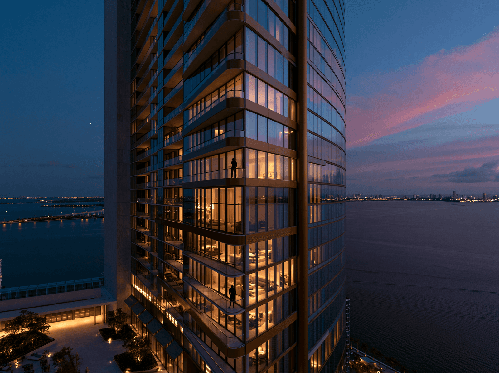 Glass tower overlooking the bay at nightfall
