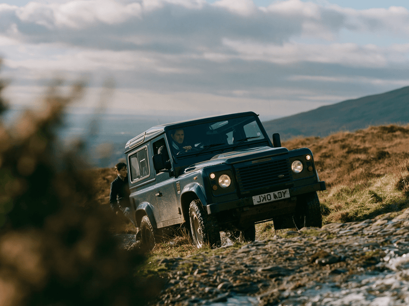Expedition vehicle crossing remote highlands