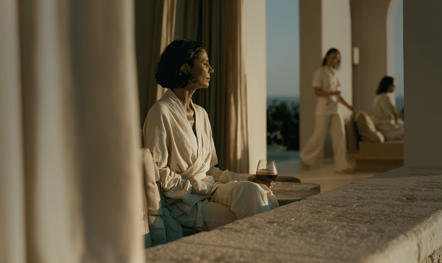 A member relaxing in a softly lit club suite