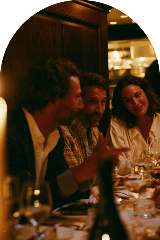 Members dining together in a club lounge